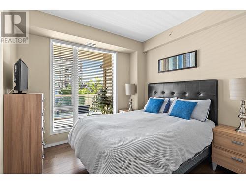1128 Sunset Drive Unit# 401, Kelowna, BC - Indoor Photo Showing Bedroom