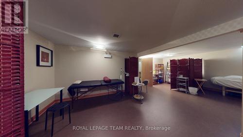 Finished open area within lower level - 942 Merivale Road, Ottawa, ON 