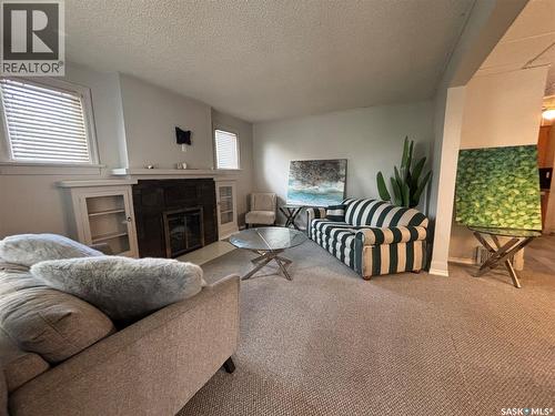 101 32Nd Street W, Saskatoon, SK - Indoor Photo Showing Other Room With Fireplace