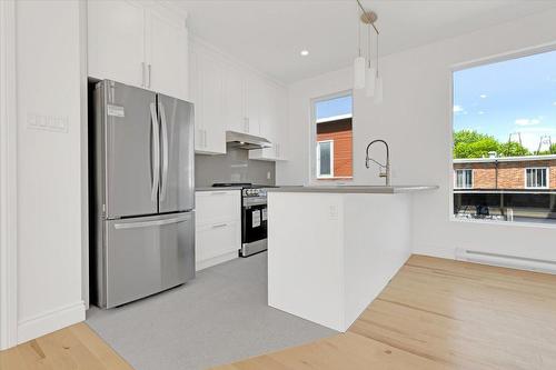 Kitchen - 202-1910 Rue Sullivan, Montréal (Le Sud-Ouest), QC - Indoor Photo Showing Kitchen With Stainless Steel Kitchen