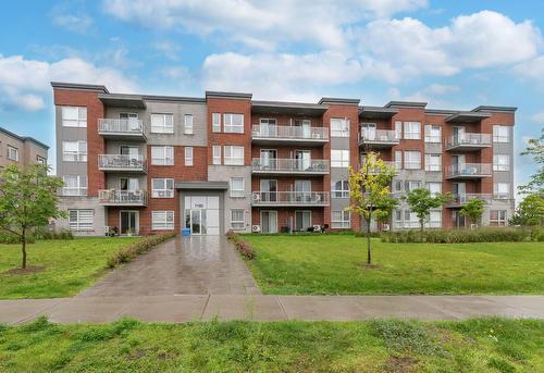 Frontage - 410-7105 Rue De Lunan, Brossard, QC - Outdoor With Facade