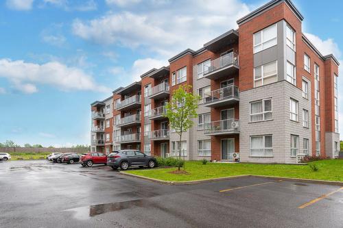 Face arrière - 410-7105 Rue De Lunan, Brossard, QC - Outdoor With Facade