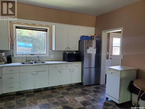 228 4Th Street E, Ponteix, SK - Indoor Photo Showing Kitchen With Double Sink