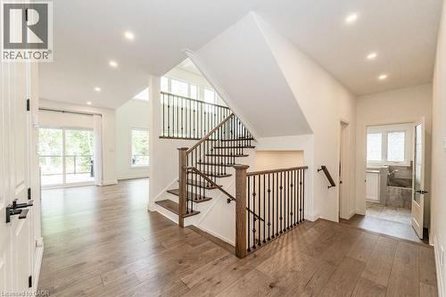 Stairway featuring wood-type flooring, plenty of natural light, recessed lighting, and baseboards - 346 Lexington Road, Waterloo, ON - Indoor Photo Showing Other Room