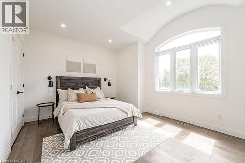 Bedroom featuring baseboards, wood finished floors, and recessed lighting - 346 Lexington Road, Waterloo, ON - Indoor Photo Showing Bedroom