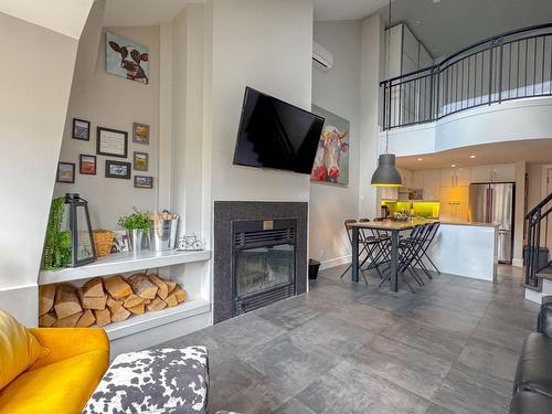 Living room - 448-116 Ch. De Kandahar, Mont-Tremblant, QC - Indoor Photo Showing Living Room With Fireplace