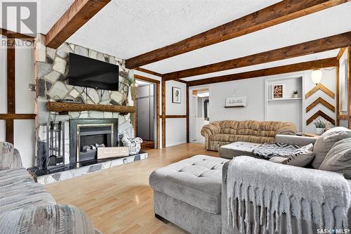 3 Elliott Drive, Sun Valley, SK - Indoor Photo Showing Living Room With Fireplace