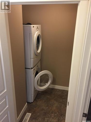 119 St John Street N, Regina, SK - Indoor Photo Showing Laundry Room