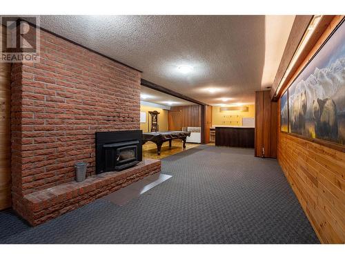 1557 Nichol Road, Revelstoke, BC - Indoor Photo Showing Other Room With Fireplace