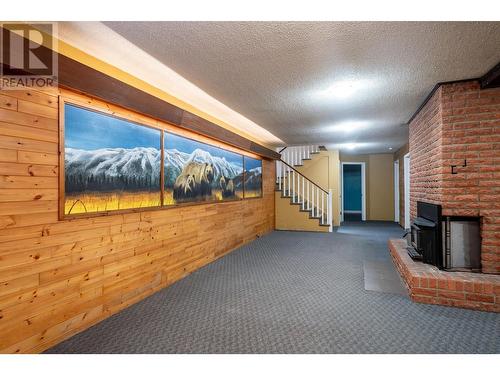 1557 Nichol Road, Revelstoke, BC - Indoor Photo Showing Other Room With Fireplace