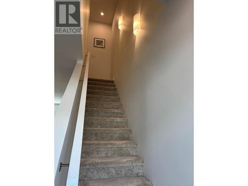 Stairs to 3rd Level - 610 Academy Way Unit# 363, Kelowna, BC - Indoor Photo Showing Other Room