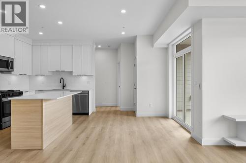 Photos may be of a similar home in the community - 5300 Main Street Unit# 202, Kelowna, BC - Indoor Photo Showing Kitchen With Stainless Steel Kitchen With Upgraded Kitchen