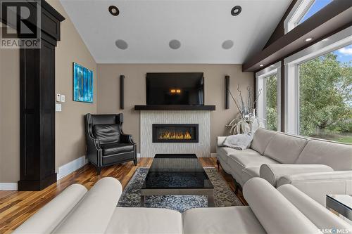 4818 Sandpiper Crescent E, Regina, SK - Indoor Photo Showing Living Room With Fireplace