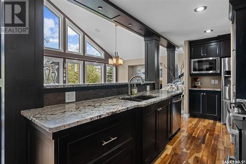 4818 Sandpiper Crescent E, Regina, SK - Indoor Photo Showing Kitchen With Double Sink