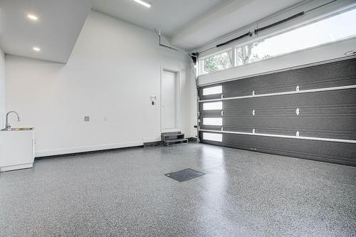 Garage - 850 Ch. Des Prairies, Brossard, QC - Indoor Photo Showing Garage