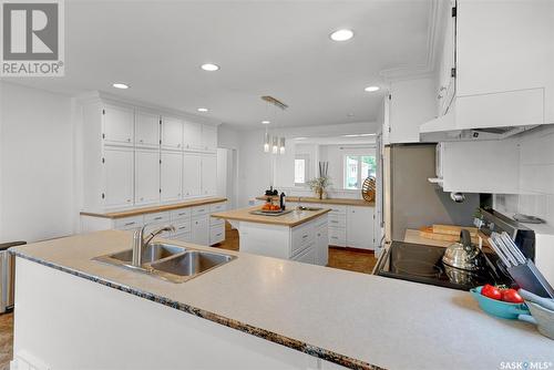 833 Keith Street, Moose Jaw, SK - Indoor Photo Showing Kitchen With Double Sink
