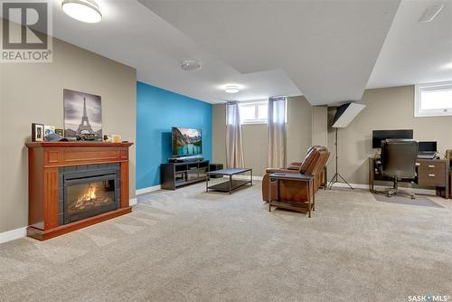 833 Keith Street, Moose Jaw, SK - Indoor Photo Showing Basement With Fireplace