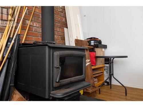 Wood burning stove has not been used by current owners - 3102 13 Street, Vernon, BC - Indoor Photo Showing Other Room