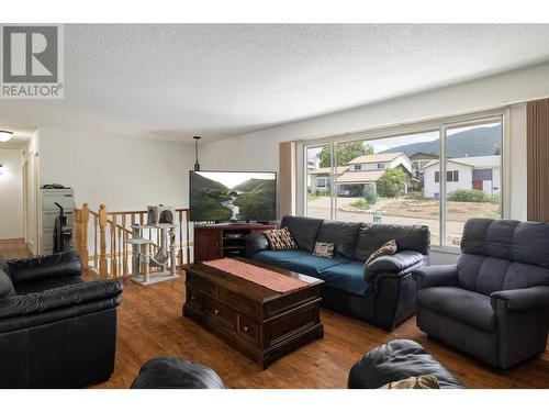 Large living room, open to dining room and kitchen - 3102 13 Street, Vernon, BC - Indoor Photo Showing Living Room
