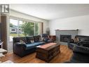 Large windows, great natural light - 3102 13 Street, Vernon, BC  - Indoor Photo Showing Living Room With Fireplace 