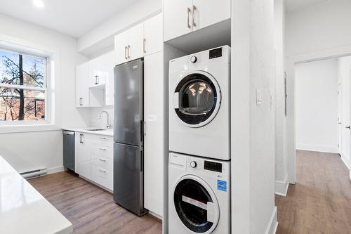 Kitchen - 1-5235 Ch. De La Côte-St-Luc, Montréal (Côte-Des-Neiges/Notre-Dame-De-Grâce), QC - Indoor Photo Showing Laundry Room
