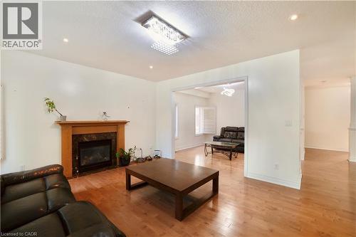 145 Redtail Street, Kitchener, ON - Indoor Photo Showing Living Room With Fireplace