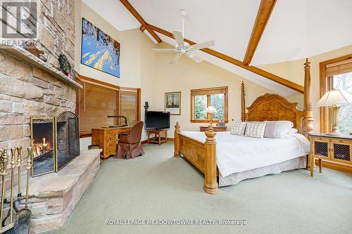 4911 Eighth Line, Erin, ON - Indoor Photo Showing Bedroom With Fireplace