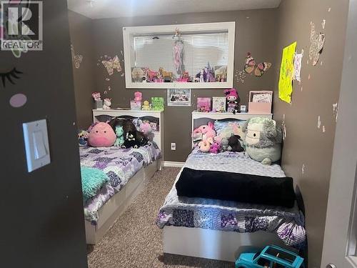 312 99 Avenue, Dawson Creek, BC - Indoor Photo Showing Bedroom