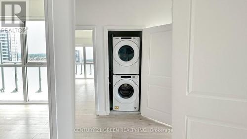 3006 - 8 Nahani Way, Mississauga, ON - Indoor Photo Showing Laundry Room