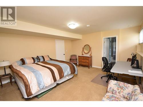 9003 Cherry Lane, Coldstream, BC - Indoor Photo Showing Bedroom