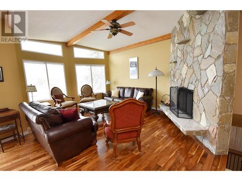 Living room - 9003 Cherry Lane, Coldstream, BC - Indoor Photo Showing Other Room With Fireplace