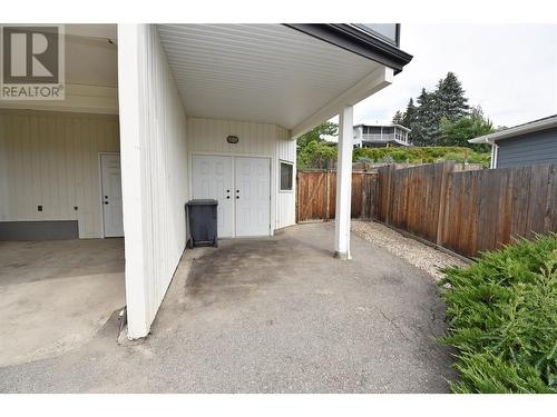 Entrance to Man Cave or Craft Room right of carport - 9003 Cherry Lane, Coldstream, BC - Outdoor With Exterior