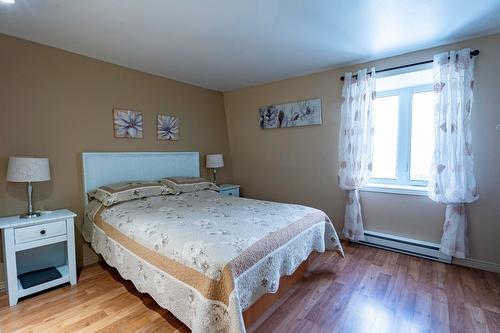 Chambre à coucher - 475 Route De La Grande-Alliance, Baie-Sainte-Catherine, QC - Indoor Photo Showing Bedroom