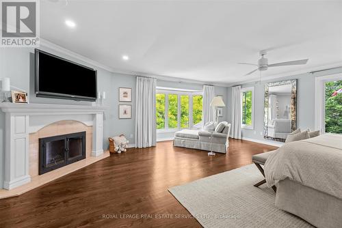Primary Suite Features a Wood-Burning Fireplace - 2315 8 Sideroad, Burlington, ON - Indoor With Fireplace