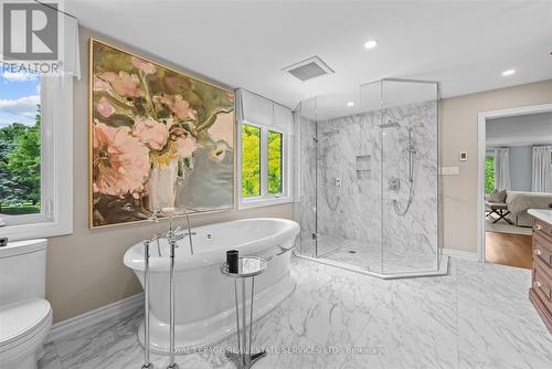 Freestanding Tub & Curbless Shower in 6-PC Ensuite - 2315 8 Sideroad, Burlington, ON - Indoor Photo Showing Bathroom