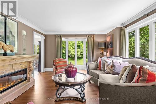 Formal Living Room with Hardwood Flooring - 2315 8 Sideroad, Burlington, ON - Indoor Photo Showing Living Room With Fireplace
