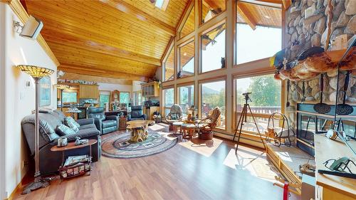 1528 Tie Lake Loop Road, Jaffray, BC - Indoor Photo Showing Living Room With Fireplace