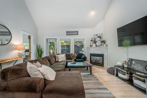 106-690 Lequime Road, Kelowna, BC - Indoor Photo Showing Living Room With Fireplace