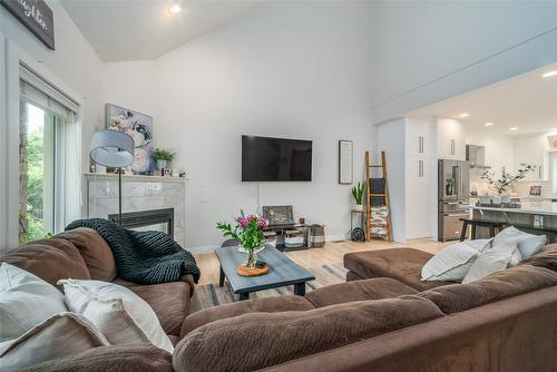 106-690 Lequime Road, Kelowna, BC - Indoor Photo Showing Living Room With Fireplace