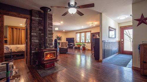 7957 Highway 3, Yahk, BC - Indoor Photo Showing Other Room With Fireplace