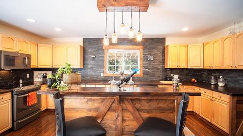 7957 Highway 3, Yahk, BC - Indoor Photo Showing Kitchen With Stainless Steel Kitchen