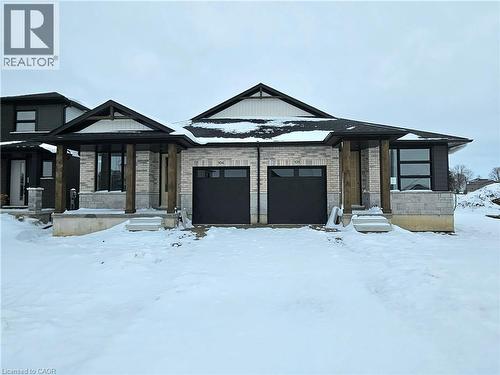 104 Thackeray Way, Harriston, ON - Outdoor With Facade