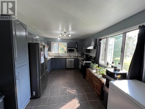 16 Walsh Road, Fort Nelson, BC - Indoor Photo Showing Kitchen