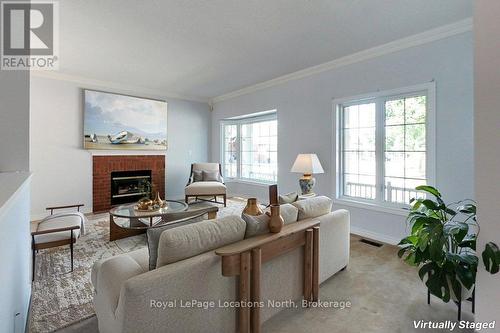 1 Wellford Gate, Brampton (Sandringham-Wellington), ON - Indoor Photo Showing Living Room With Fireplace