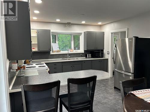 516 First Avenue E, Lampman, SK - Indoor Photo Showing Kitchen With Double Sink
