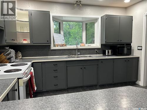 516 First Avenue E, Lampman, SK - Indoor Photo Showing Kitchen With Double Sink