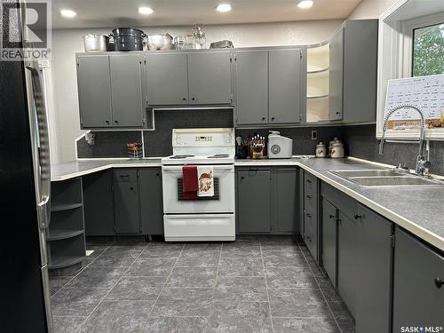 516 First Avenue E, Lampman, SK - Indoor Photo Showing Kitchen With Double Sink