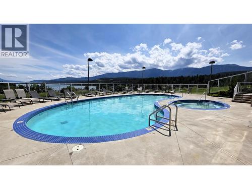 701 14A Crescent Unit# 213 I, Invermere, BC - Outdoor With In Ground Pool With Backyard