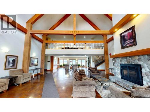 701 14A Crescent Unit# 213 I, Invermere, BC - Indoor Photo Showing Living Room With Fireplace