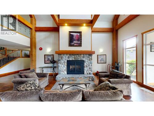 701 14A Crescent Unit# 213 I, Invermere, BC - Indoor Photo Showing Living Room With Fireplace